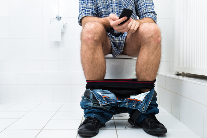 using mobile on toilet