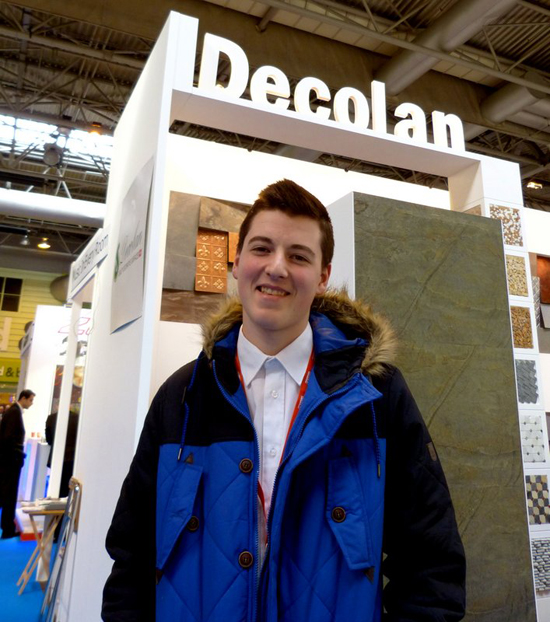 Our employee Declan standing in front of the Decolan stand