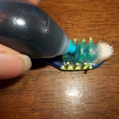 Food colouring on toothbrush