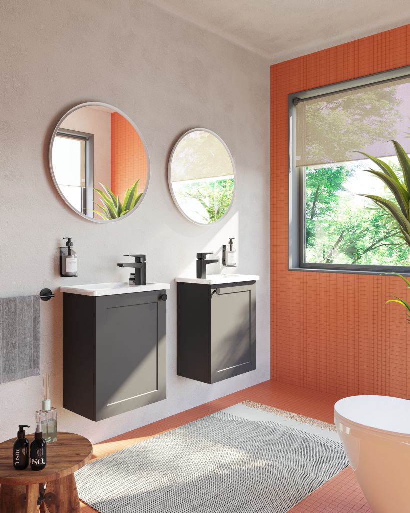 Image of a bathroom lifestyle that has an orangey peach feature wall by VitrA